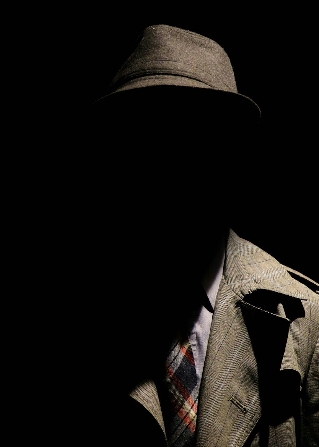 shadowy detective figure