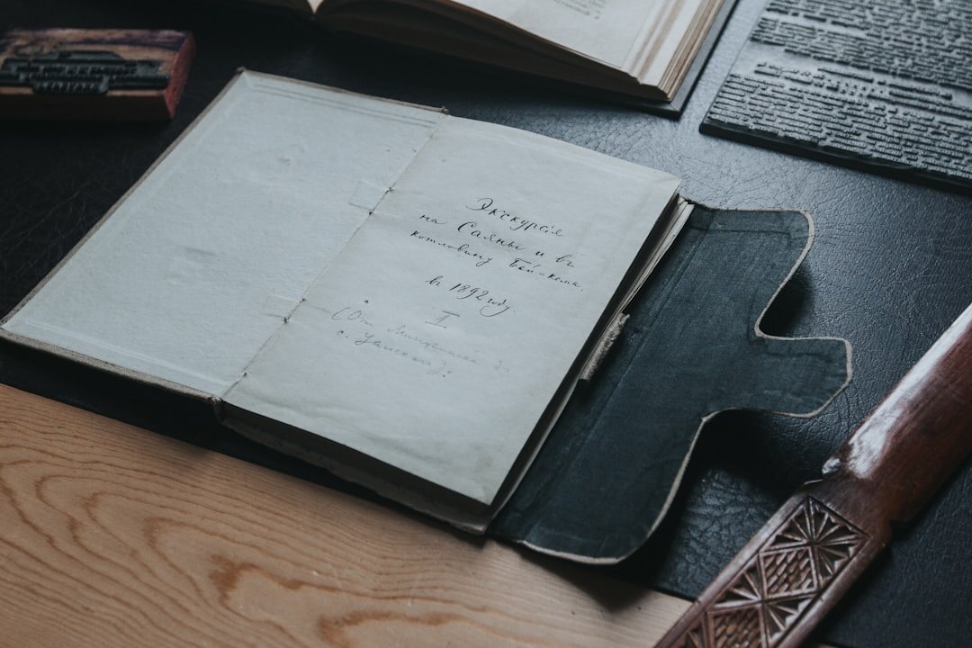 person opening old book